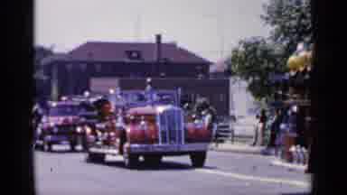 MINEOLA NEW YORK-1966: Two And Then Three Vintage Red Fire Rescue Vehicles