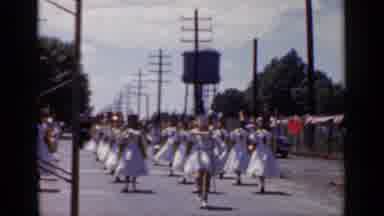 Mineola New York (1966): Ladies In A Flag Corps March In A Festive Parade On A