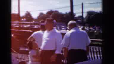 Mineola New York (1966): Truck Races By Then Men Fall To The Ground After Chasing