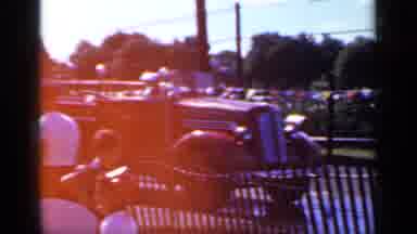 Mineola New York (1966): Fire Truck Races By Then Men In White Tee Shirts Rush To