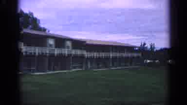 Massachusetts USA (1968): Apartment Building With Water And Bridge On A Cloudy Day