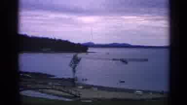 Massachusetts USA (1968): A Panoramic A Large Lake Surrounded By Trees On A Cloudy