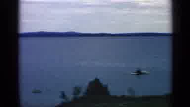 Massachusetts USA (1968): Man Trees Hill Ocean Orange Thing The Sky Gray Gates