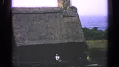 Massachusetts USA (1969): Man Chopping Wood Zoom Out Shot Of House Sometime In The