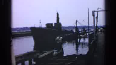 Massachusetts USA (1969): Large Boat Docked At Wooden Pier On A Clear Sunny Day