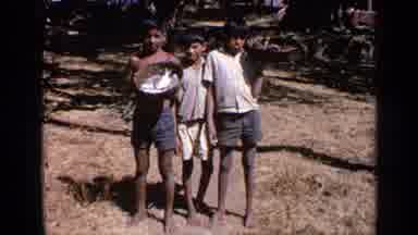 India (1970): Young Fisherman From Asian Country Holding Fishes In A Basket