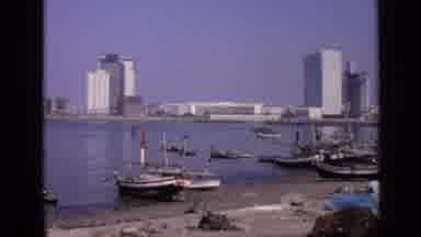 India (1970): Waterfront With A Port With Fishing Boats In Front Of Multi-Storey