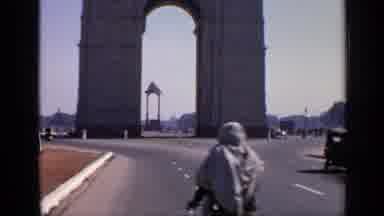 India (1970): Cyclists And Cars On A Road In An East Asian Country