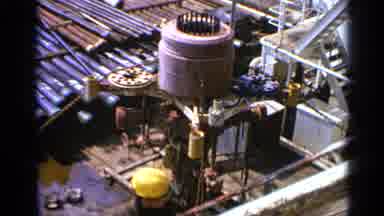 United Kingdom (1970): Ocean Oil Drill Workers Inspecting Pipes On Top Of The Oil