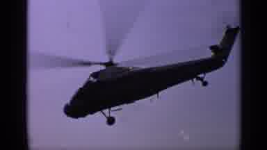 United Kingdom-1970: Helicopter Flying Over Sea And Offshore Oil Rig