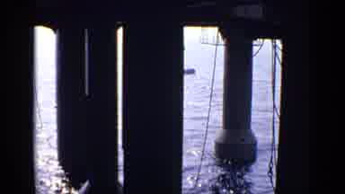 United Kingdom (1970): Red Round Object Floats In Blue Water On A Bright Sunny Day