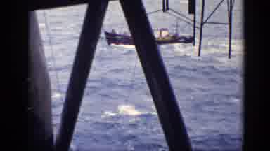United Kingdom (1970): Brown Boat In Open Water On A Clear Day