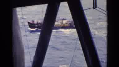 United Kingdom (1970): View Brown Tug Boat In Water On A Clear Day