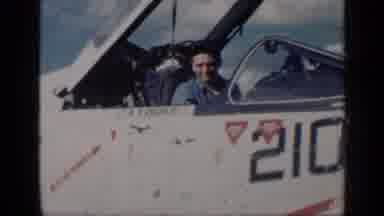 CUBA-1962: Man Wearing Blue Shirt Climbs Out Of White Plane On A Bright Sunny Day