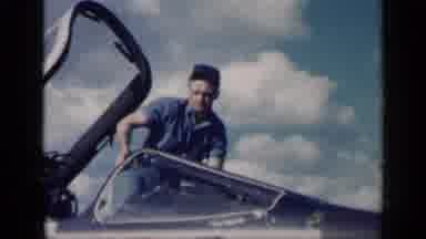 CUBA-1962: Technician Exits Airplane Cockpit as Bird Soars