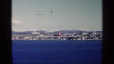 CUBA-1962: Red Airplane On Coastal Runway By Ocean