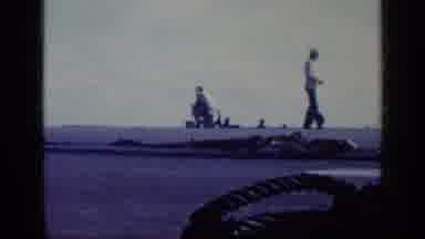 Cuba (1962): A Military Jet Takes A Cue To Lift Off A Navy Aircraft Carrier From