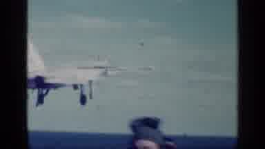 CUBA-1962: Military Plane Taking Off Over The Ocean From An Aircraft Carrier As