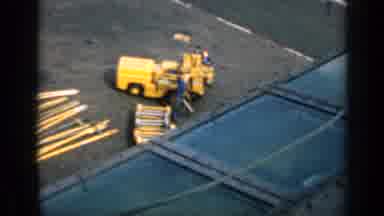 CUBA-1962: Construction Workers Operating Forklift on Industrial Site