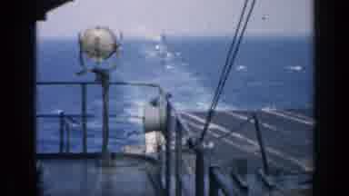 Cuba (1962): Aircraft Carrier Passes Through An Ocean Or Watercourse Yellow Trucks