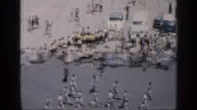 CUBA-1962: Marching Band Parades Through Crowded Street