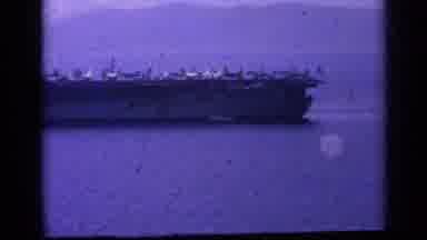 Italy-1962: Aircraft Carrier Carrying Fighter Jets On Calm Sea