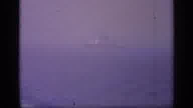 Italy (1962): Foggy Battle Scene Over The Lilac Water Boats Of White Float And