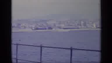 Italy (1962): Mountains Blue Water And Coastal City On A Clear Sunny Day