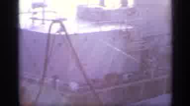 Italy (1962): Large Ship With Cables And Another One Following In The Distance