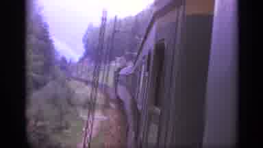 Italy (1962): Looking Out Window Of Train As It Passes By Some Snow-Capped