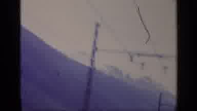 Italy (1962): Mountain Range Viewed From A Moving Vehicle Passing Poles Buildings