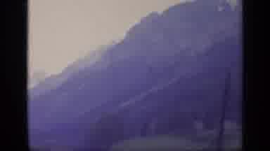 Italy (1962): Amazing A Snow Covered Mountain Range With A Few Houses In The