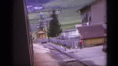 Italy (1962): Guard Walks His Post Along Railway Then Sight Of Mountains In The