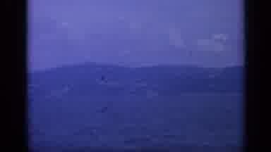 Italy (1962): Mountains And Blue Water On A Sunny Day