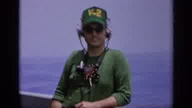 Italy (1962): Green Clothes Military Man Waves From On Deck Our At Sea