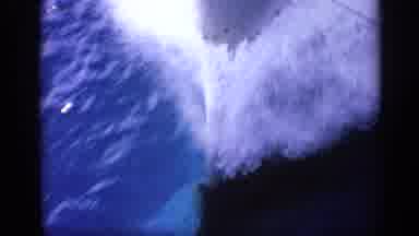 Italy (1962): Camera Captures The Large Boat Cutting Through The Water At High