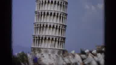 Italy-1962: Four Funny Sailors In White Uniforms Acting Like They Are Pushing The Tower