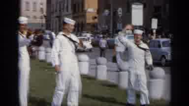Italy (1962): Sailors Gather In A Park By A Road As They Laugh And Wave