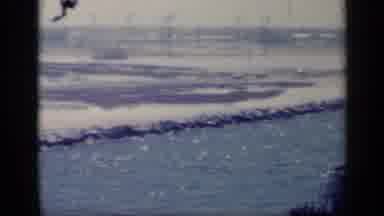 Italy (1962): White And Brown Landscape Next To River With Far Cars