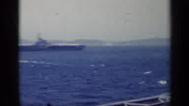 Italy (1962): Aircraft Carrier Out On The Blue Waters Under A Clear Sky With