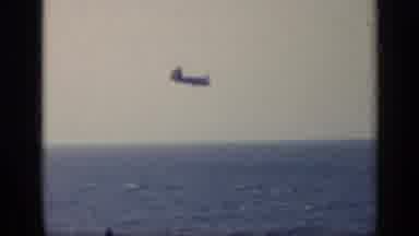 Italy (1962): Helicopter Flying Over A Big Open Ocean