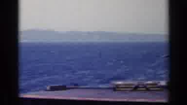 Italy (1962): Two Carrier Ships At A Close Distance While Sailing At A Calm Seas