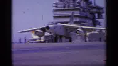 Greece (1963): A Navy Soldier Directs A Fighter Jet As It Prepares To Take Off