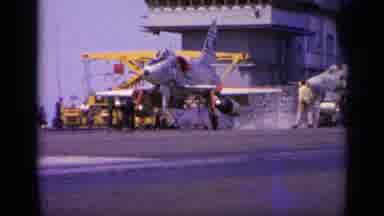 Greece (1963): Low Angle A Military Jet Taking Off On An Aircraft Carrier Runway