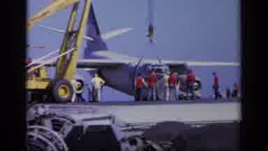 Greece (1963): Military Plane Hooked To A Crane On A Naval Warship Being Worked On