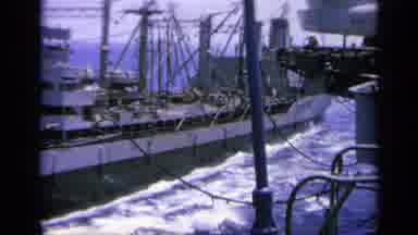 Greece (1963): Gray Ship Sails Alongside Of Aircraft Carrier On A Sunny Day