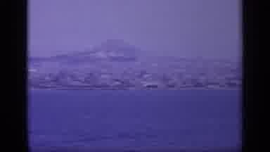 GREECE-1963: Sweeping Rocky Coastline With Mountains Rising In The Background