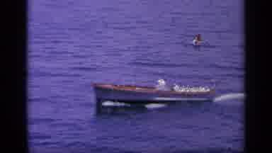 Greece (1963): Small Navy Boat Cruises Through The Water In A Celebration Event