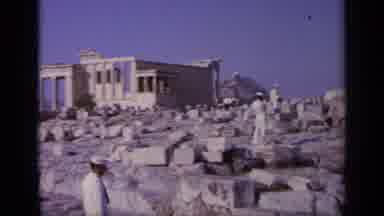 Greece (1963): A Woman Man And A Navy Seal Are Walking The Grounds At The Ancient