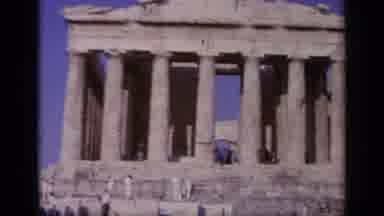 Greece (1963): There Is Some Type Of Ancient Memorial And Many People Are Working